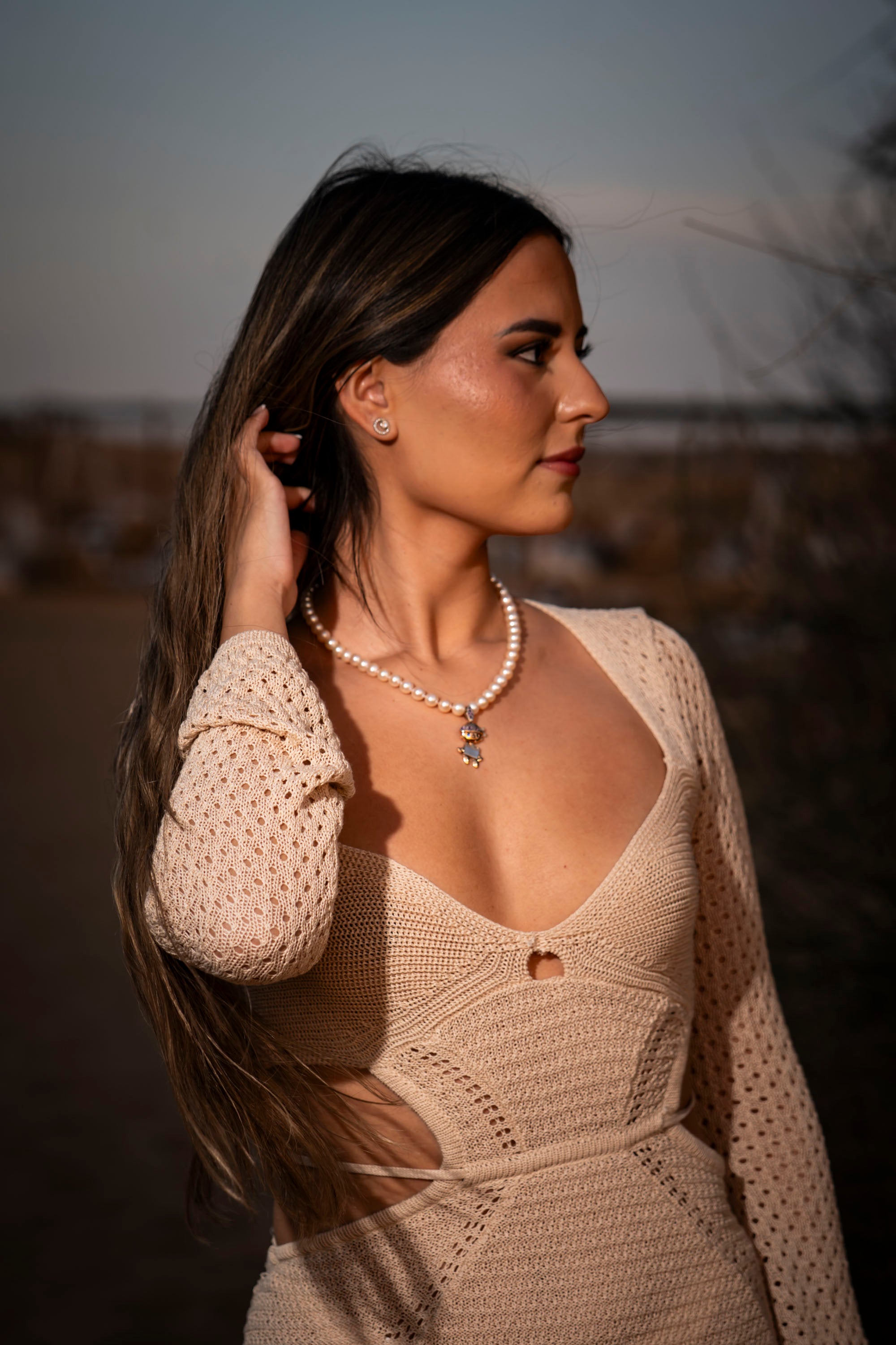 woman is wearing talia jewel as necklace