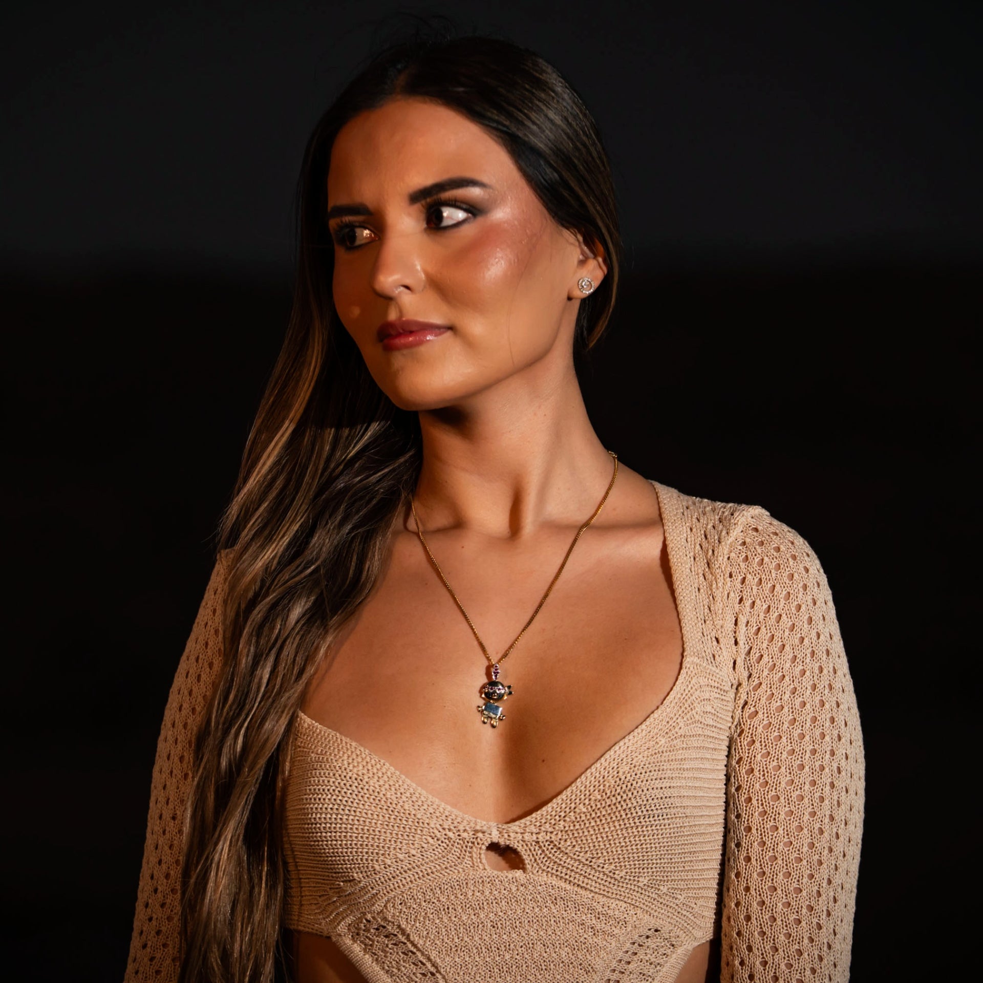 woman is wearing talia jewel as necklace